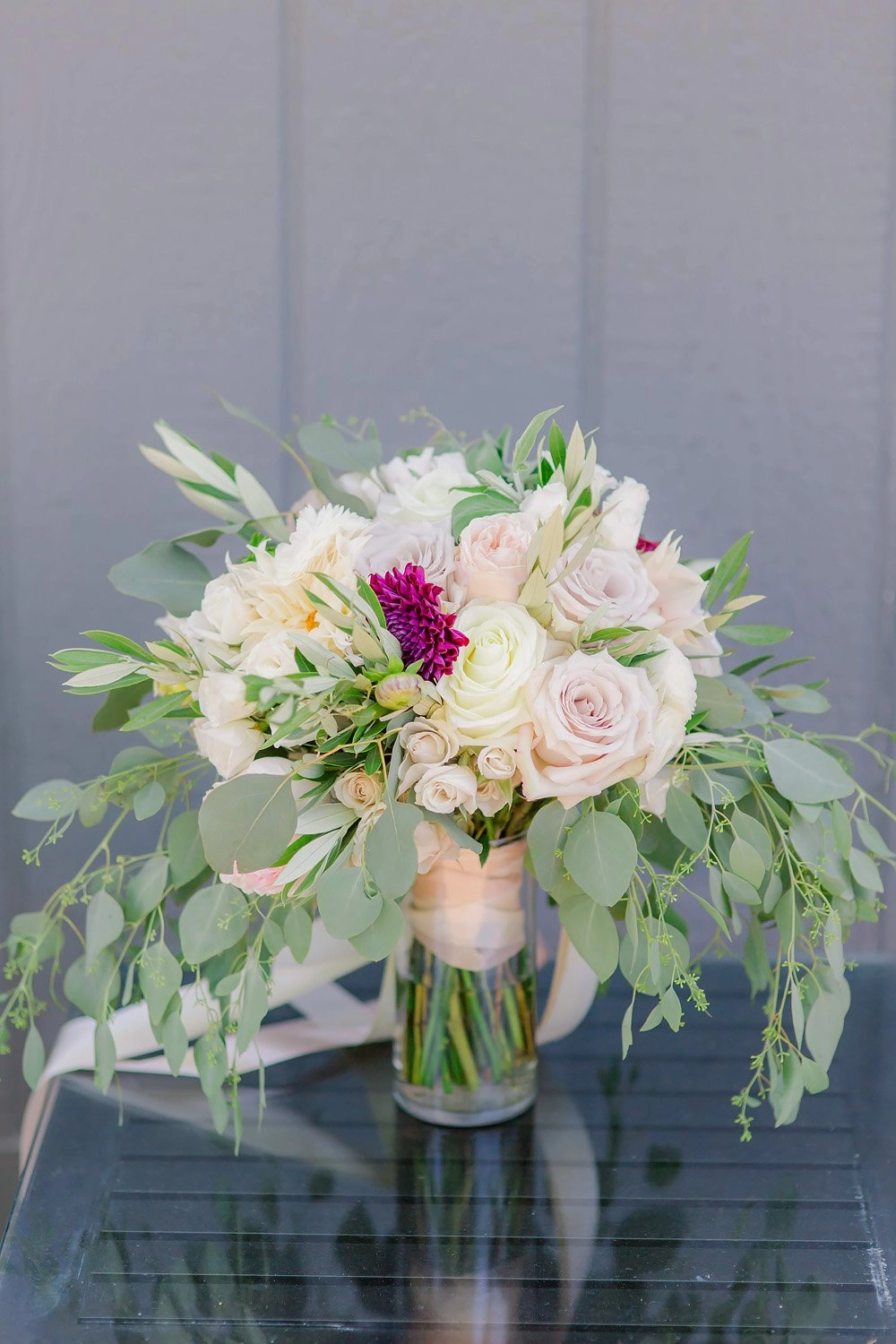 Ivory and blush bridal bouquet with trailing eucalyptus
