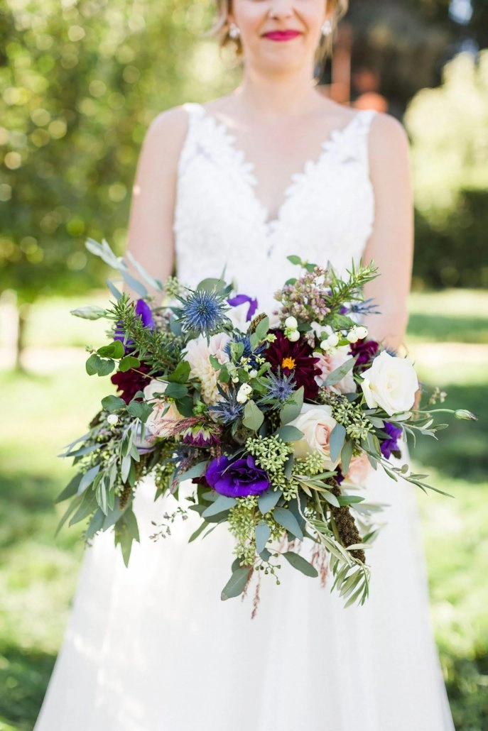 Bride with purple bouquet